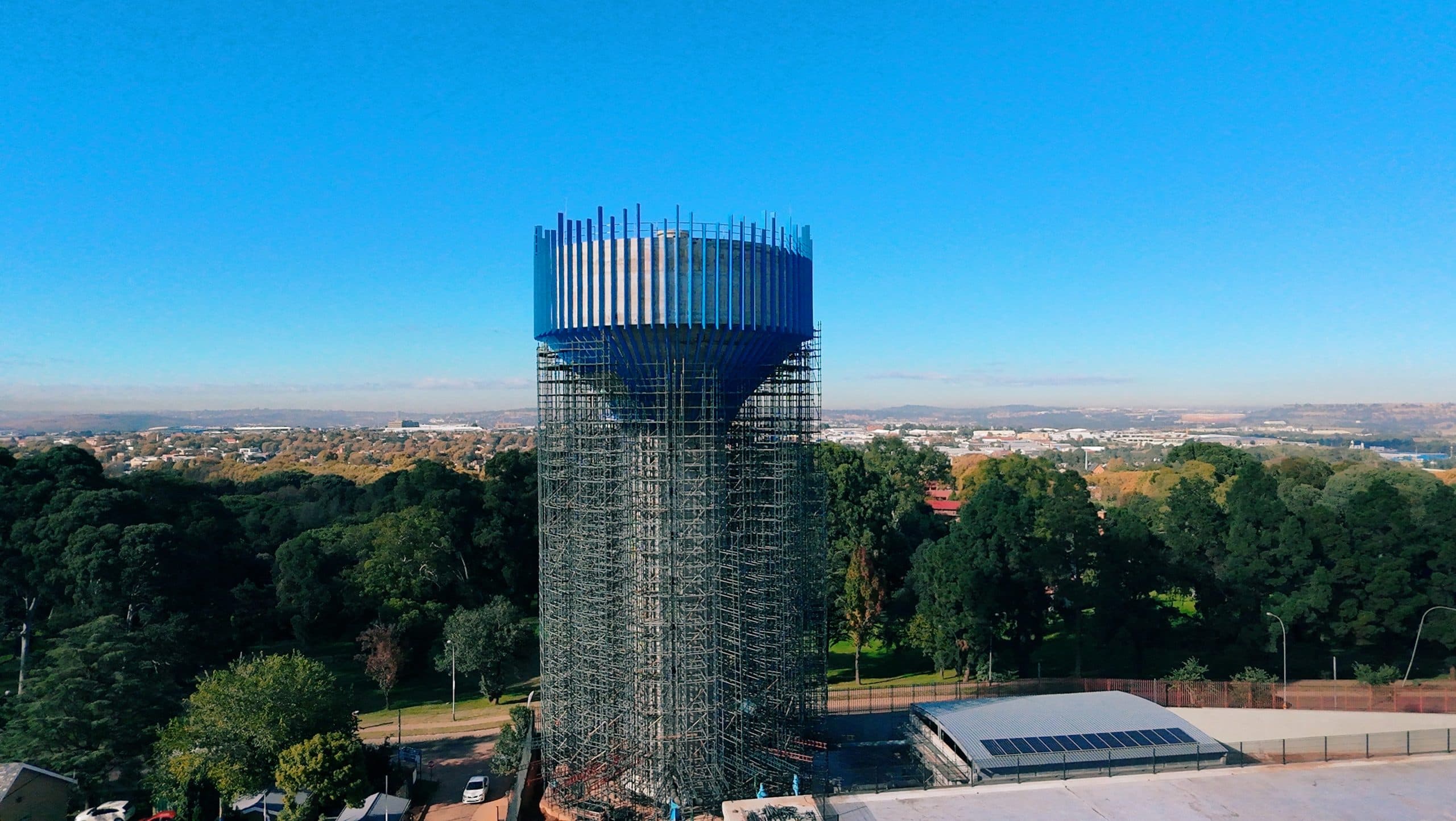 Completed Brixton water tower rising over the Johannesburg skyline
